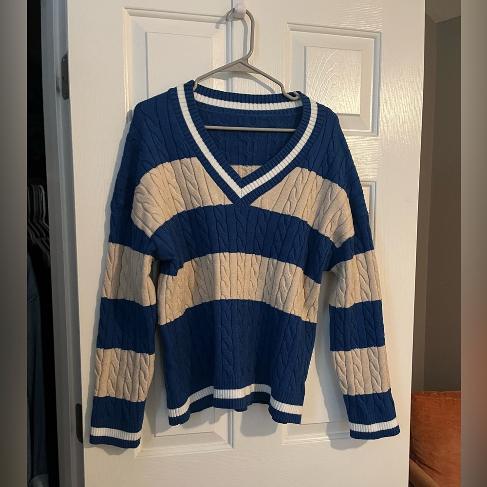 Cream and blue rugby sweater. V-neck. Knit sweater with stretch. Size Large.